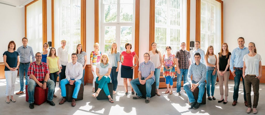 Gruppenfoto von Mitarbeitern eines Unternehmens in Berlin